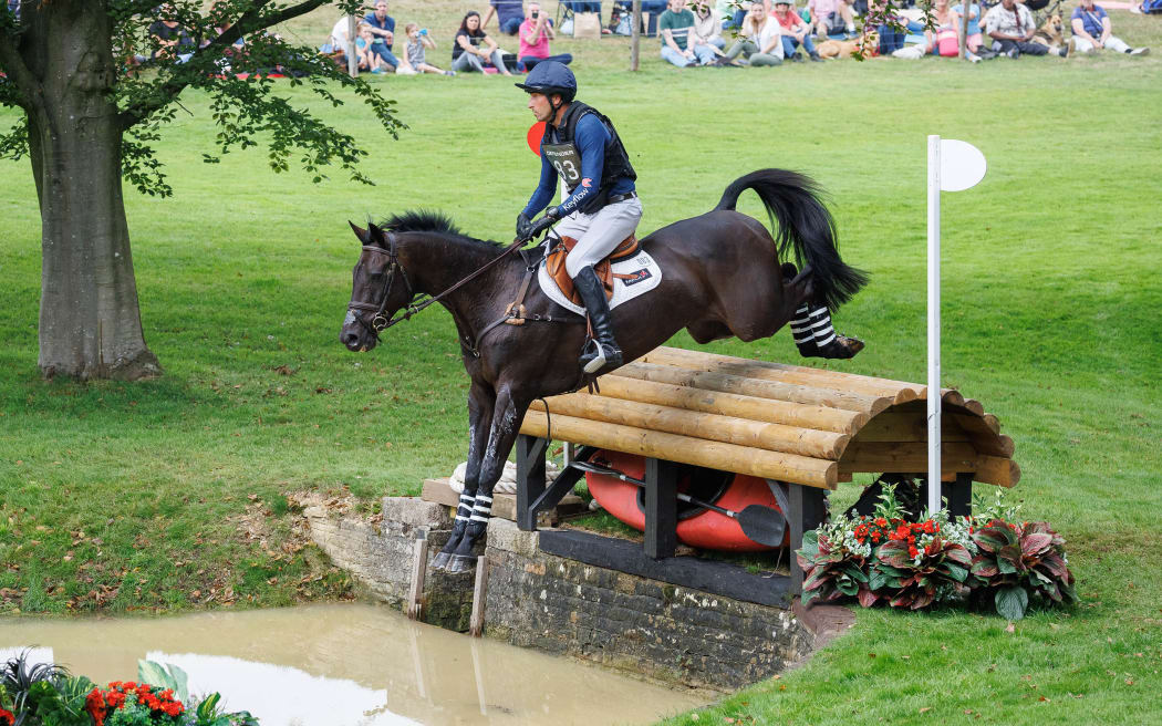 New Zealand equestrian Tim Price rides Vitali during the Cross Country of the 2024 Burghley Horse Trials.