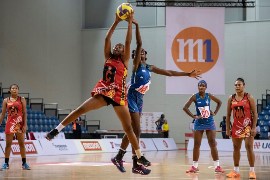 PNG and Namibia battle for the ball