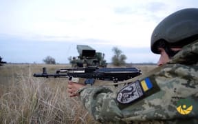 Ukraine soldiers conducts tactical exercises at one of the all-military training grounds of the southern Ukraine's Kherson region.