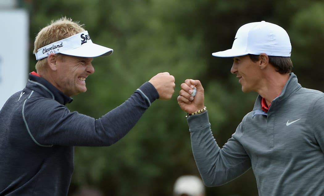 Winners Søren Kjeldsen and Thorbjørn Olesen celebrate at 2016 World Cup of Golf