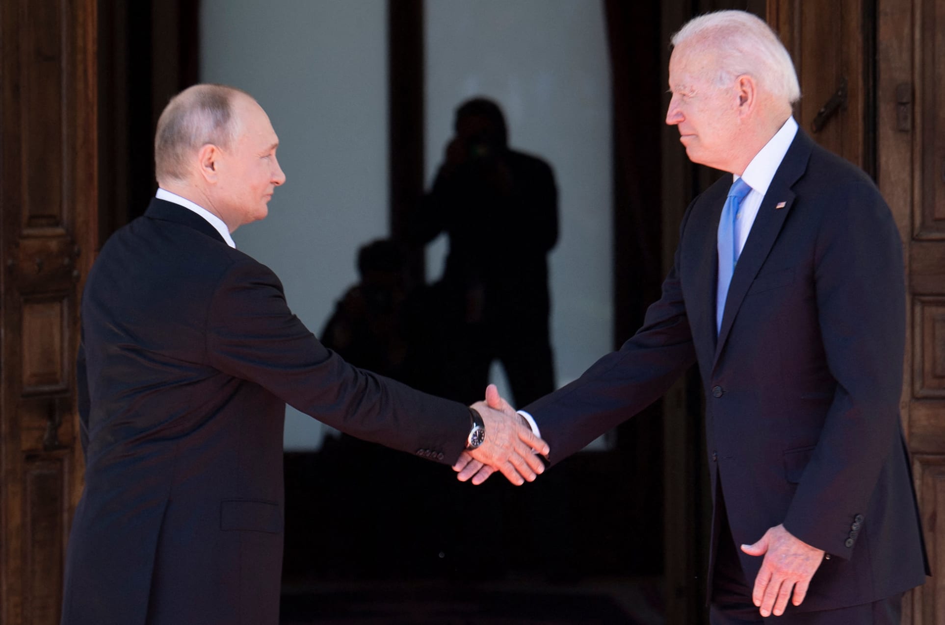 Russian President Vladimir Putin shakes hands with US President Joe Biden prior to the US-Russia summit in Geneva on 16 June 2021.