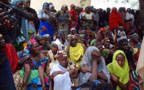 Mothers of the missing schoolgirls abducted by Boko Haram Islamists gather to receive infomations from officials on 5 May 2014.