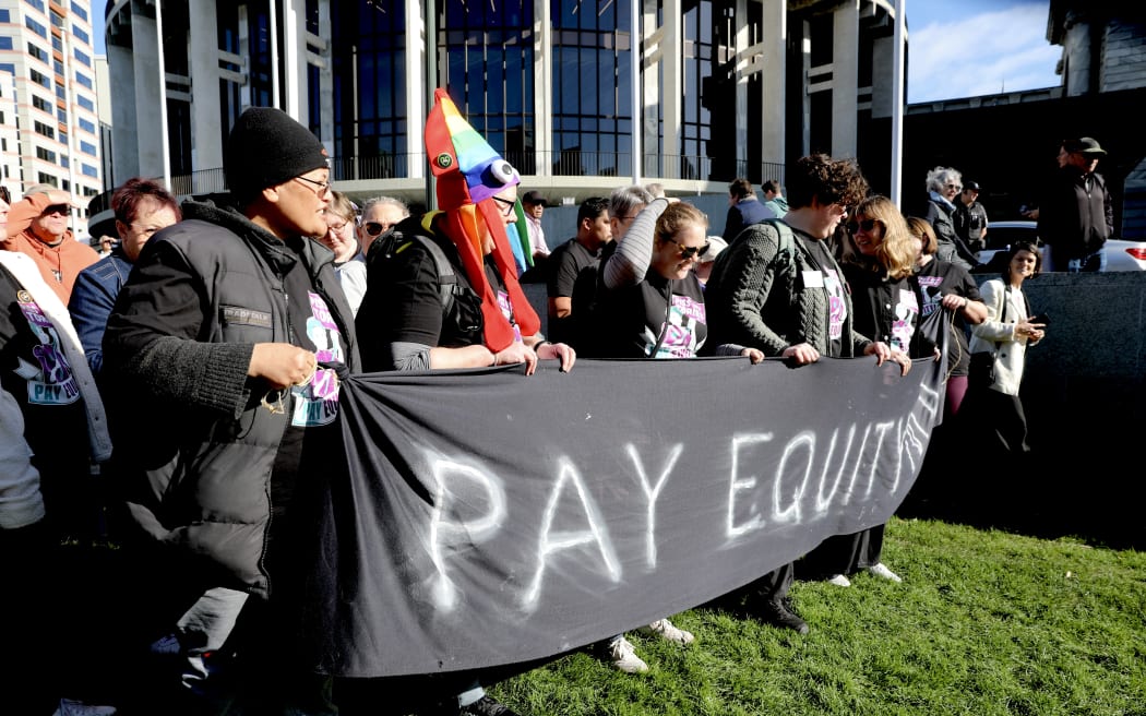 Budget Day 2025 - pay equity protestors voice their opinions outside Parliament