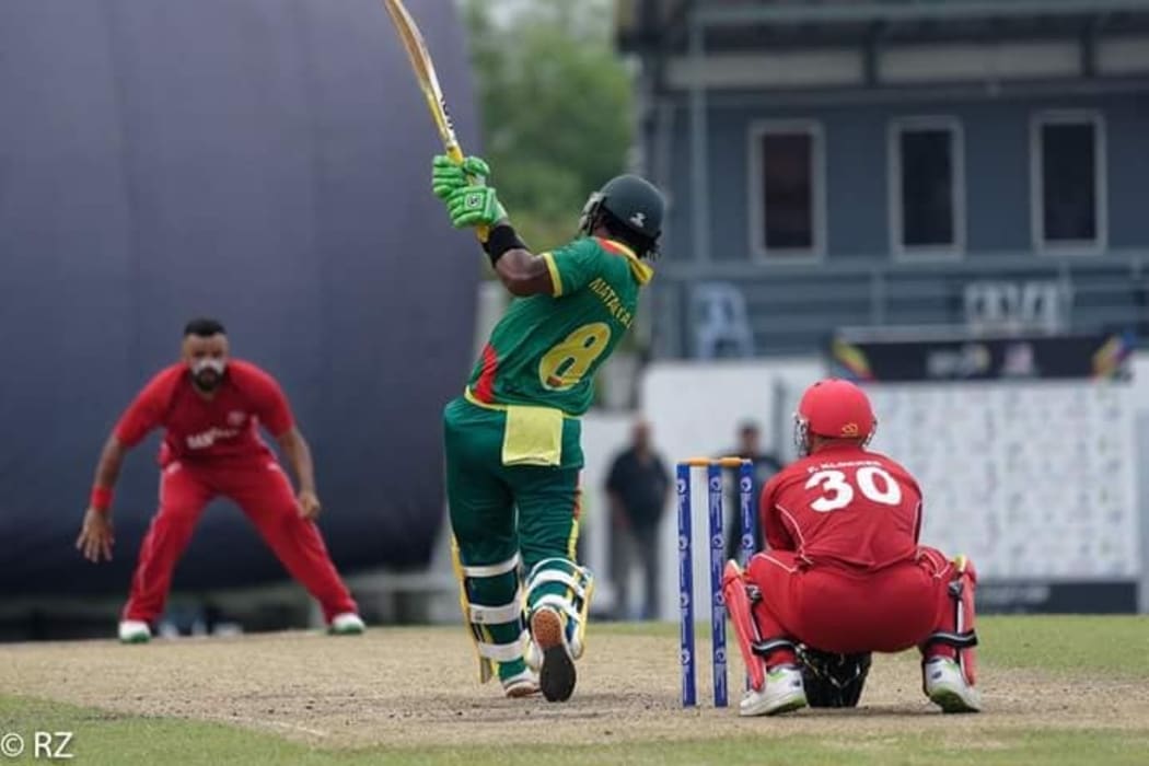 Patrick Matautaava starred with bat and ball against Denmark.