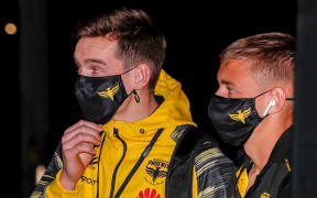 Phoenix players wearing masks.