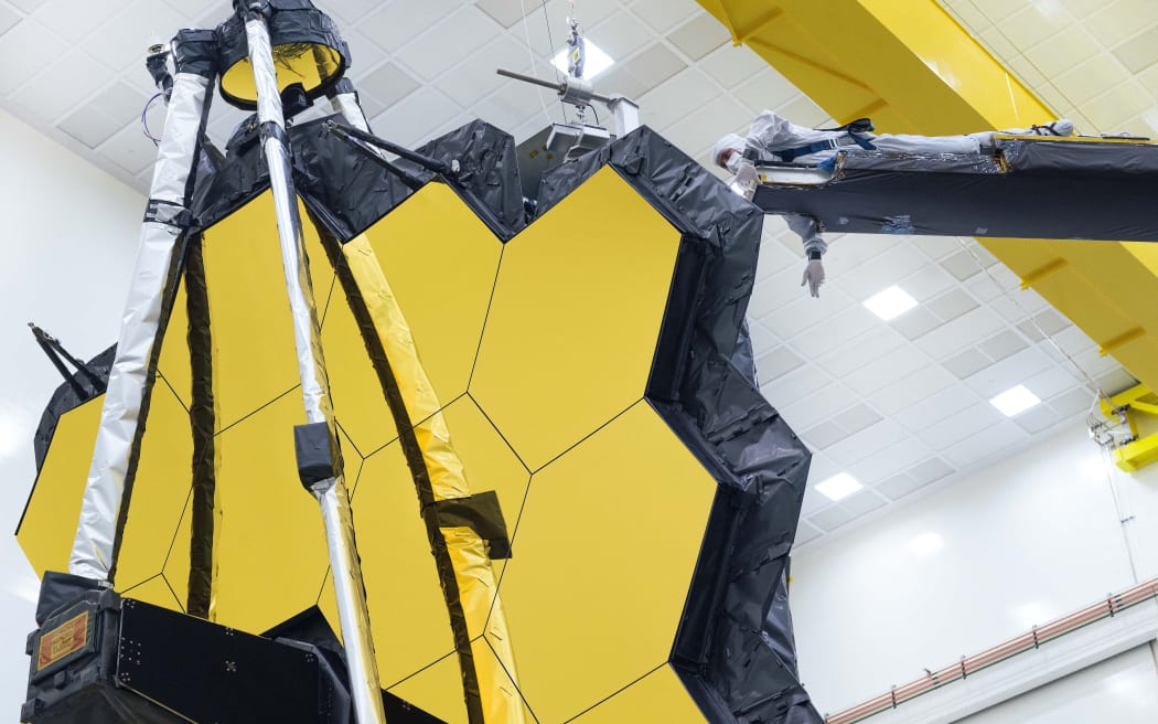 This handout image released by NASA on May 11, 2021 shows NASA's James Webb Space Telescope undergoing tests at Northrop Grumman in Redondo Beach, California.
