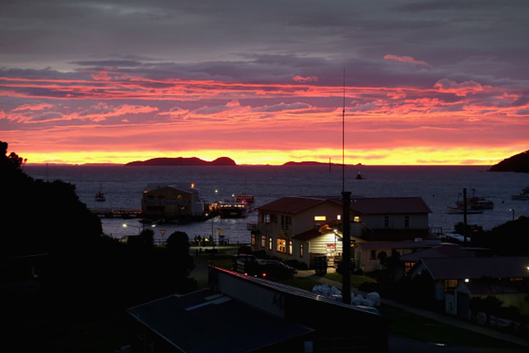 Sunrise over the Southsea Hotel in Oban, Stewart Island, in May 2015.