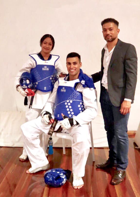 Tonga's Maila Paseka, Pita Taufatofua and coach Master Paul Sitapa.