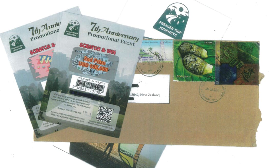 An image of the envelopes being sent out in the post.