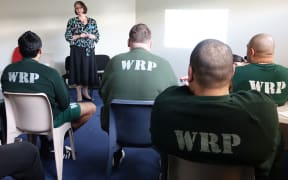 Brenda Allen-Browne speaking with prisoners at Rimutaka Prison.