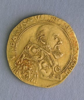 A file photo of an old coin from Avignon, France, showing Pope Urban VIII.