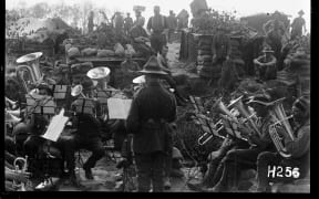 A NZEF military band playing close to the line near Ypres, France, 1917
