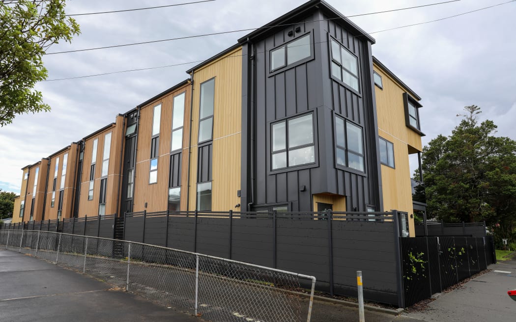 Newer styled terrace/apartment housing on Pt Chevalier Road, opposite the Pt Chevalier Rugby League Club - slated for demolition - 03 December 2025. Can be used as a generic.