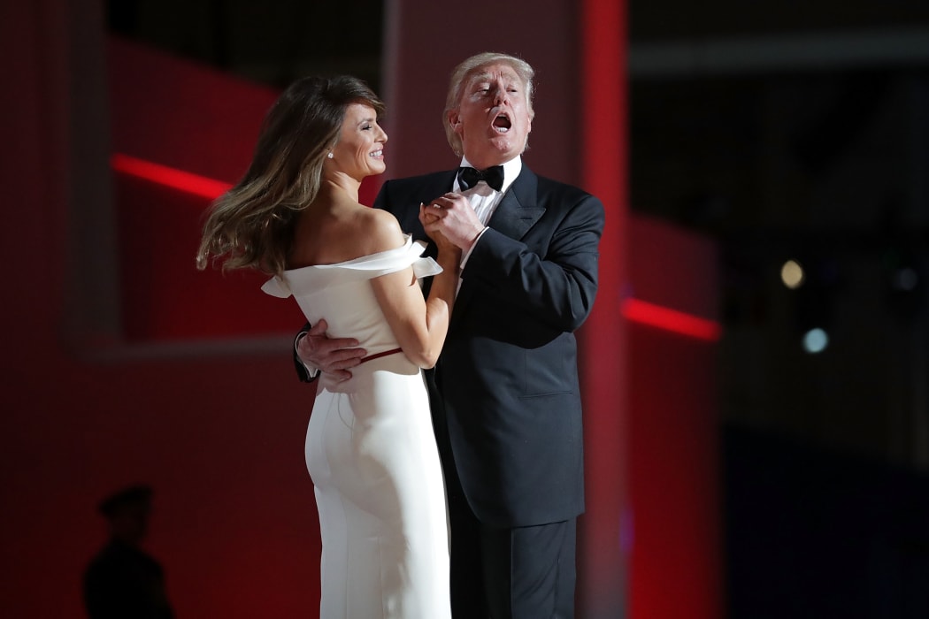 January: US President Donald Trump sings to the song "My Way" while dancing with first lady Melania Trump following his inauguration.