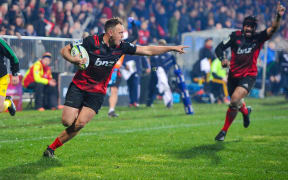Israel Dagg of the Crusaders scores a try.