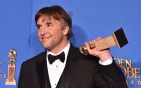 Director Richard Linklater, winner of Best Director for 'Boyhood,' poses in the press room during the 72nd Annual Golden Globe Awards.