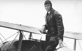Charles Lindbergh standing by 'Spirit of St Louis'