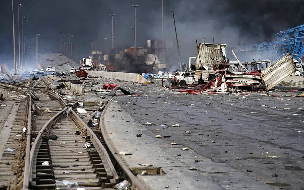 A handout picture provided by the Iranian Red Crescent (RCS) on April 27, 2025, shows the devastation at the scene of an explosion that took place a day earlier at the Shahid Rajaee port dock southwest of Bandar Abbas in the Iranian province of Hormozgan. Fires were still blazing on April 27 after a massive explosion tore through Iran's largest commercial port the day before, killing at least 25 people and leaving hundreds more injured, according to local media. (Photo by Iranian Red Crescent / AFP) / === RESTRICTED TO EDITORIAL USE - MANDATORY CREDIT "AFP PHOTO / HO / IRANIAN RED CRESCENT" - NO MARKETING NO ADVERTISING CAMPAIGNS - DISTRIBUTED AS A SERVICE TO CLIENTS ===