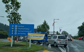 Cars queue at a pop up Covid-19 testing station at the Trafalgar Centre carpark on Paru Paru Road in Nelson.