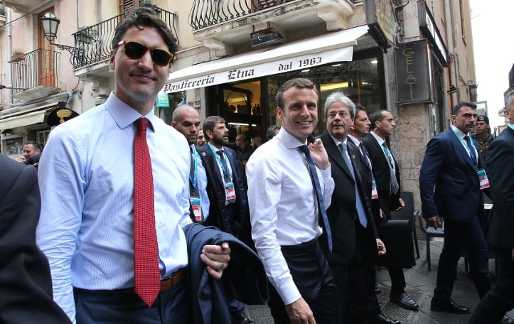 Emmanuel Macron (centre) and Justin Tudeau (left) at the G7 Taormina summit.