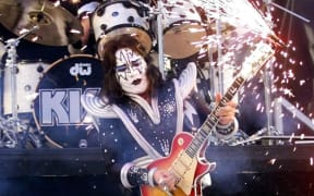 Ace Frehley performs with rock group KISS at Super Bowl XXXIII.