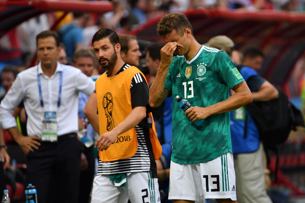 Germany's forward Thomas Mueller (right) at the end of the Group F match against South Korea.