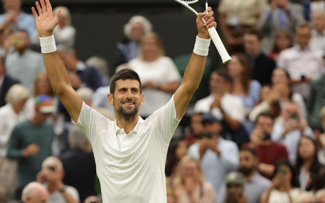 Novak Djokovic of Serbia celebrates after winning the Gentlemen’s Singles Semi-finals match against Jannik Sinner of Italy in the Championships, Wimbledon at All England Lawn Tennis and Croquet Club in London, the United Kingdom on July 14, 2023. ( The Yomiuri Shimbun ) (Photo by Tetsu Joko / Yomiuri / The Yomiuri Shimbun via AFP)