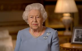 A grab taken from a recorded television broadcast shows Britain's Queen Elizabeth II speaking to the nation to mark the 75th anniversary of VE Day (Victory in Europe Day), the end of the Second World War in Europe from Windsor on 8 May 2020.