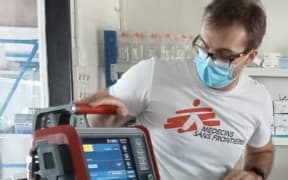 MSF's Doctor Darren Pezzack, an emergency doctor working in Kiribati – setting up some equipment in the COVID-19 high dependency space near the Central hospital on south Tarrawa. 2022
