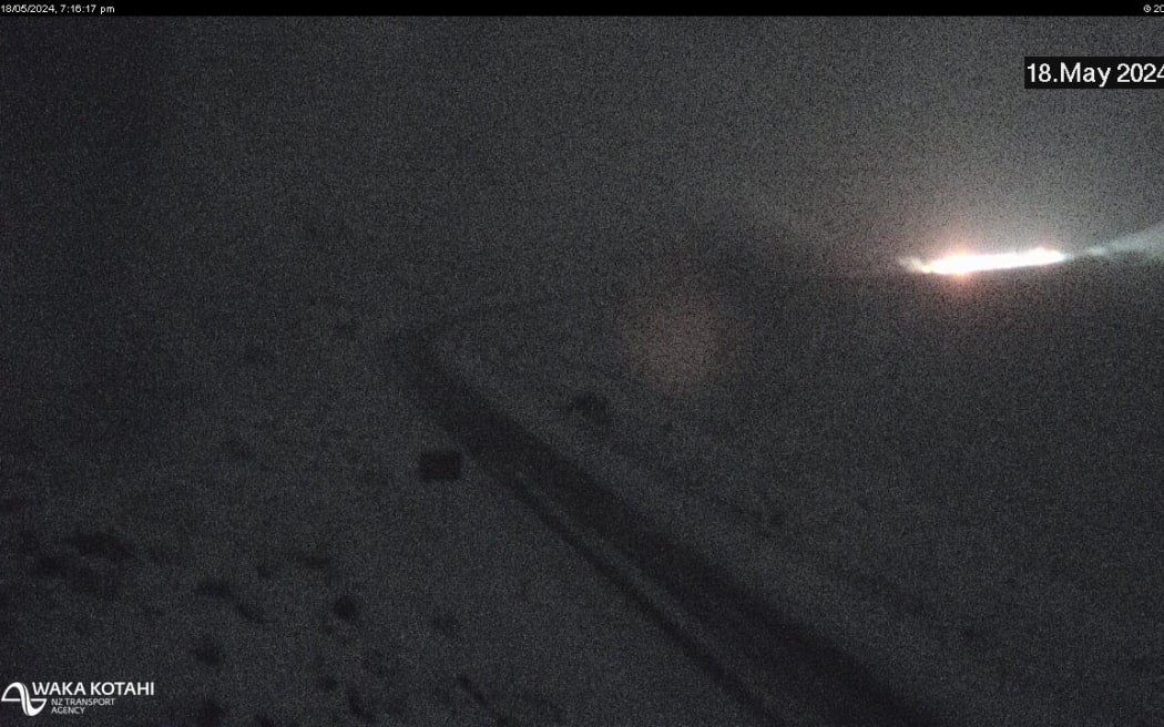 Snow seen south along SH8 towards Lindis Pass summit lookout, on 18 May, 2024.