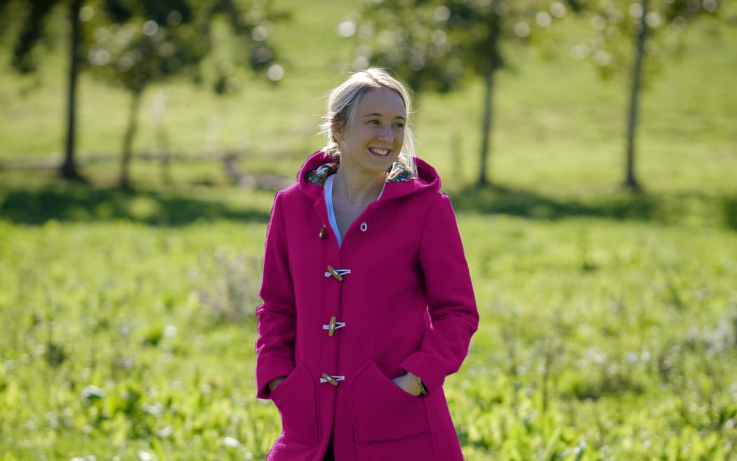 Claire Williamson, wearing one of her fashion company's wool coats.