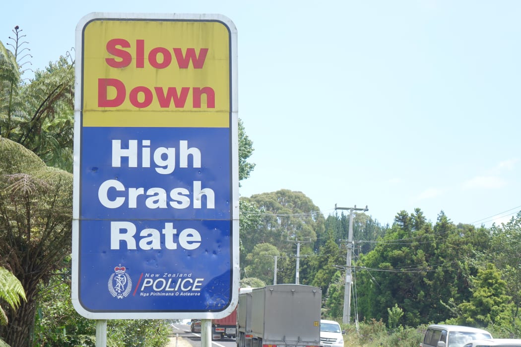 A sign on SH2 warning motorists to slow down.