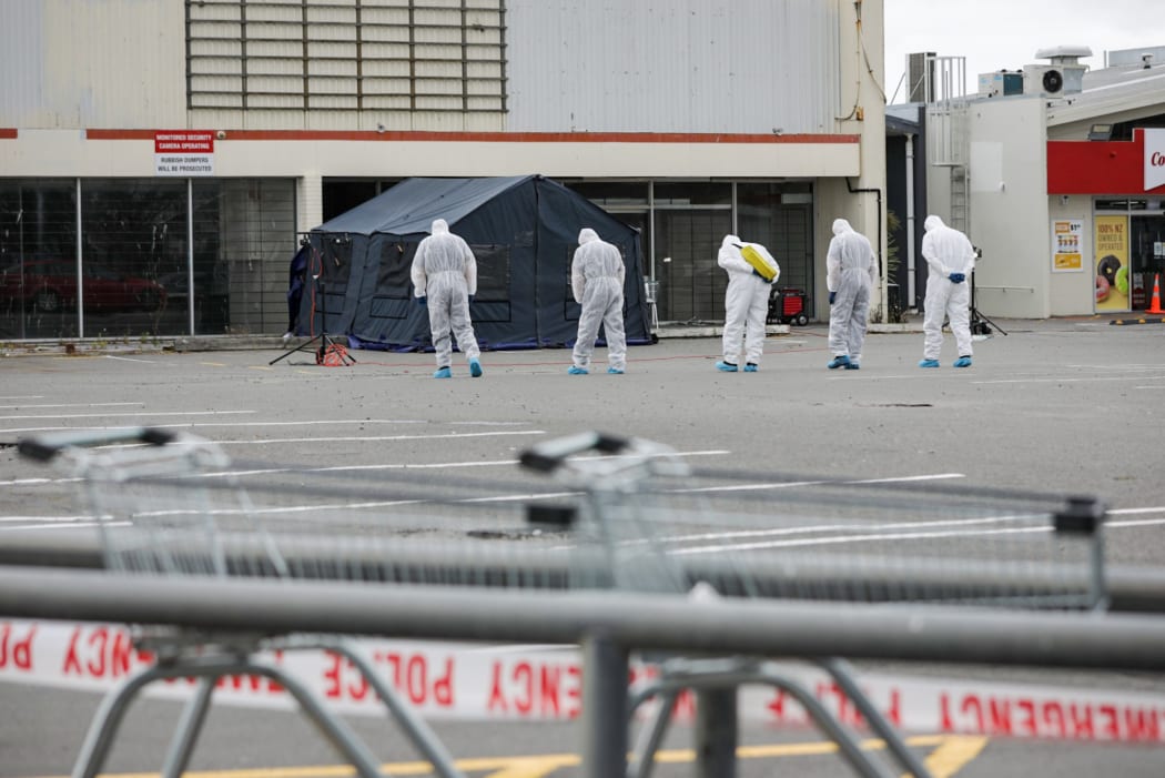 A homicide investigation is underway after a woman was killed near a supermarket carpark in New Brighton.