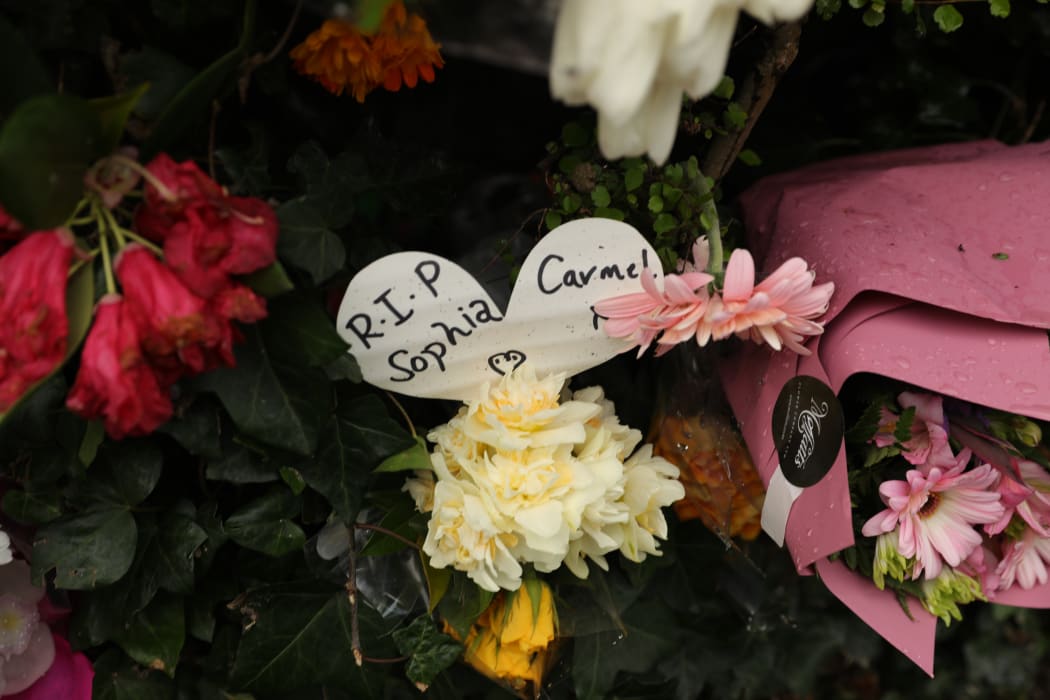 Flowers placed outside the flat in Dundas Street, Dunedin where 19-year-old Sophia Crestani died during a party on Saturday 5 October.
