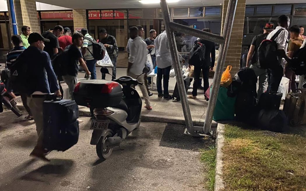 Refugees gather at Nauru airport for transfer to the US, 11-6-20.