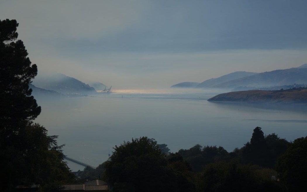 Smoke on the water of Lyttelton Harbour, caused by the Port Hills fires.