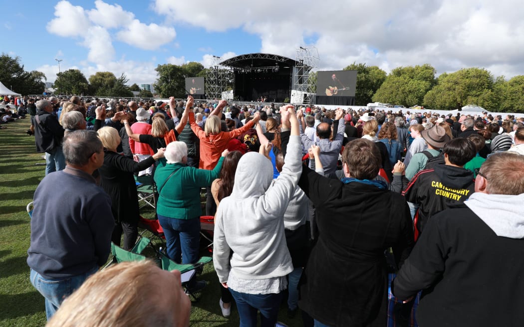 Old and young gather at Hagley Park for the national remembrance service in Christchurch.