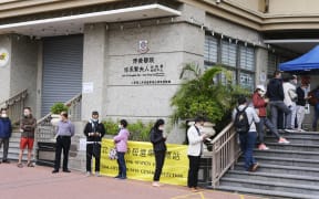 Voters wait to cast ballots in the election for the seventh-term Legislative Council (LegCo) of the Hong Kong Special Administrative Region at a polling station in Whampoa.