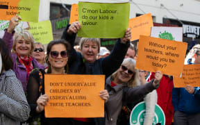 Teachers march on Queen Street in a bid for better pay rates.