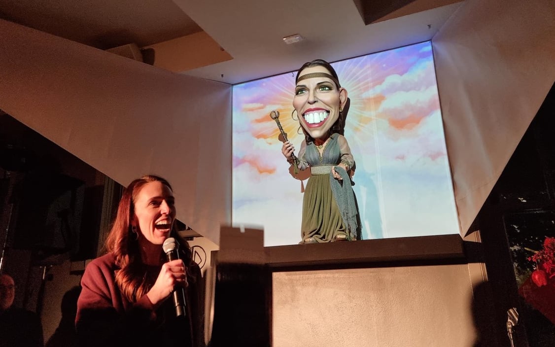 Prime Minister Jacinda Ardern reacts to the puppet caricature revealed at Wellington's Backbencer pub.
