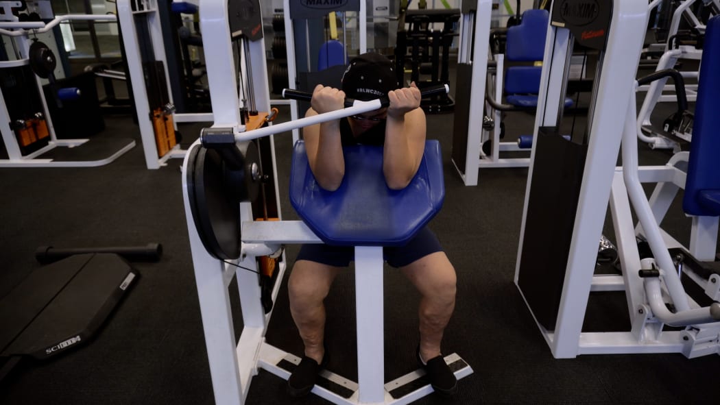 Jesse Coles-Hart works hard at the gym.