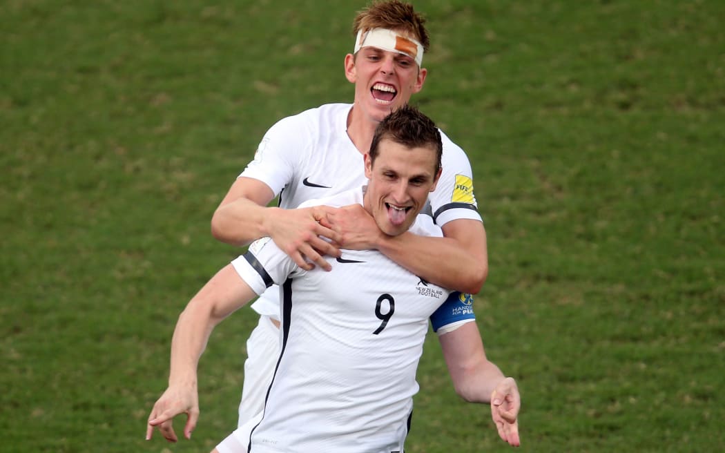 All Whites captain Chris Wood celebrates his goal against New Caledonia.