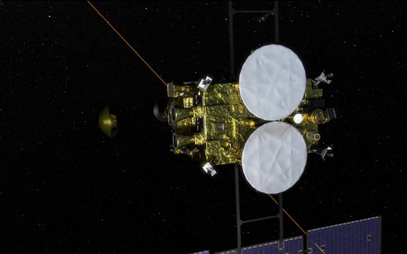 An artist's rendering of the separation of a capsule from the space probe Hayabusa-2, containing a sample collected from the asteroid Ryugu.