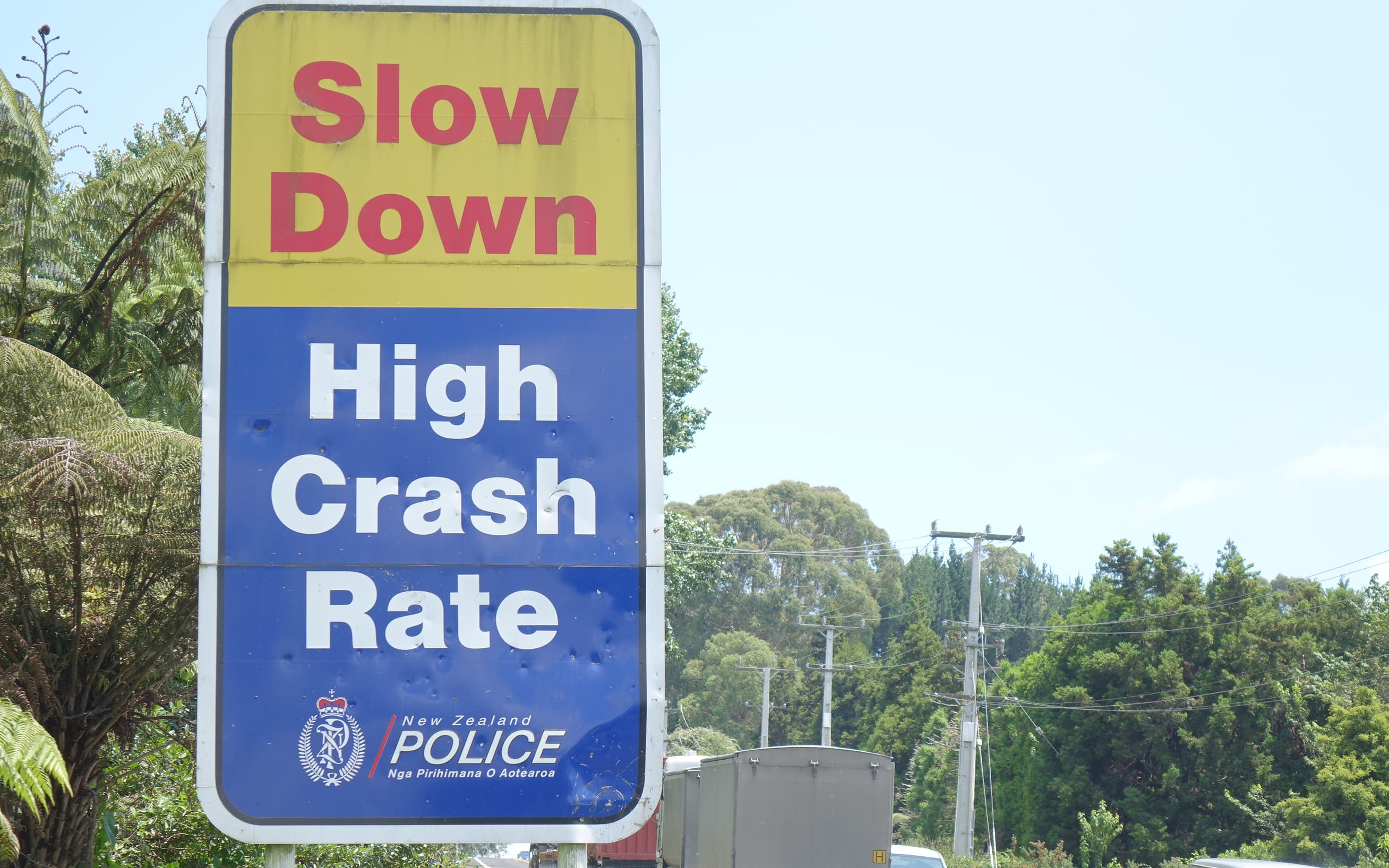 A sign on SH2 warning motorists to slow down.