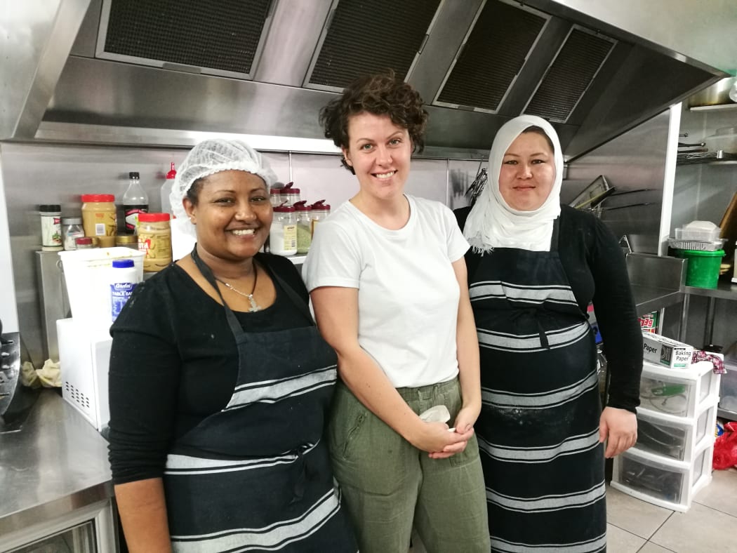 From left, Genet Seyoum, Pomegranate Kitchen co-founder Rebecca Stewart, and Fatima Qasim Ali.