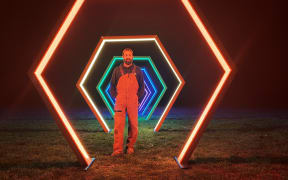 Anthony Van Dorsten in front of Full Spectrum.