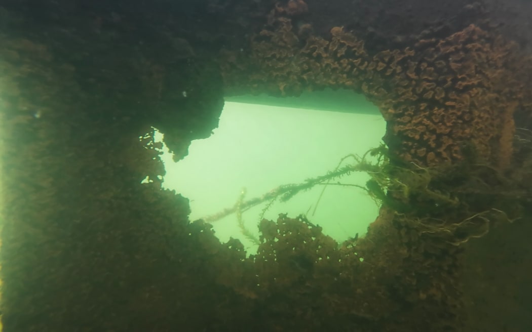 The Ōhau channel diversion wall was built in 2008 to divert polluted nutrient-rich water from Lake Rotorua, which otherwise flowed into Lake Rotoiti through a small channel, but critics say holes from corrosion allows water through.