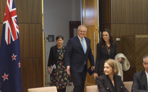 Australian Prime Minister Scott Morrison with New Zealand Prime Minister Jacinda Ardern head into a meeting in July, 2019.