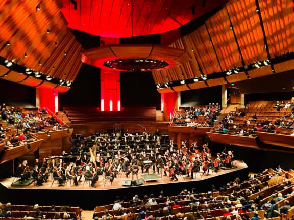 Violinist Angelo Xiang Yu performing with the NZSO at the Michael Fowler Centre