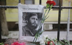 Flowers have been left outside the Cuban Embassy in Moscow after the death of Fidel Castro.